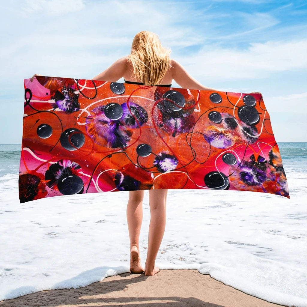 Serviette ATTRACTION tenue à bout de bras sur la plage — Collection Essentielle ARTGY7